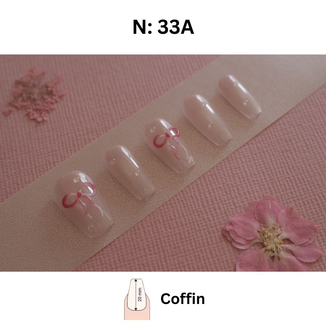 N°33 – Pink Ribbon Charm | Coffin & Almond