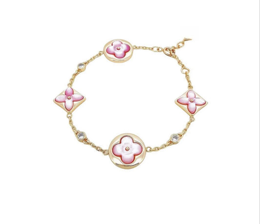 STAR AND SUN 4 MOTIF PINK MOP PINK GOLD BRACELET